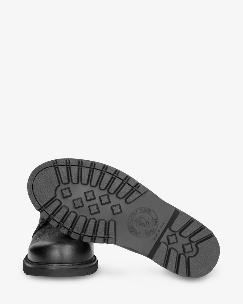 Bota Panama Tor botín de piel con forro interior de piel. negro