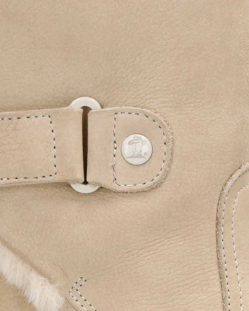 Felia Trav botas de piel con forro interior de pelo. crudo