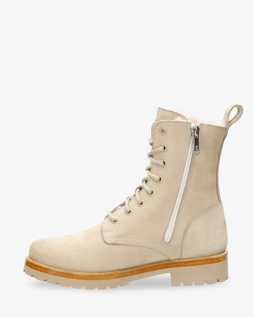 Frisia botas de piel con forro interior de pelo. crudo