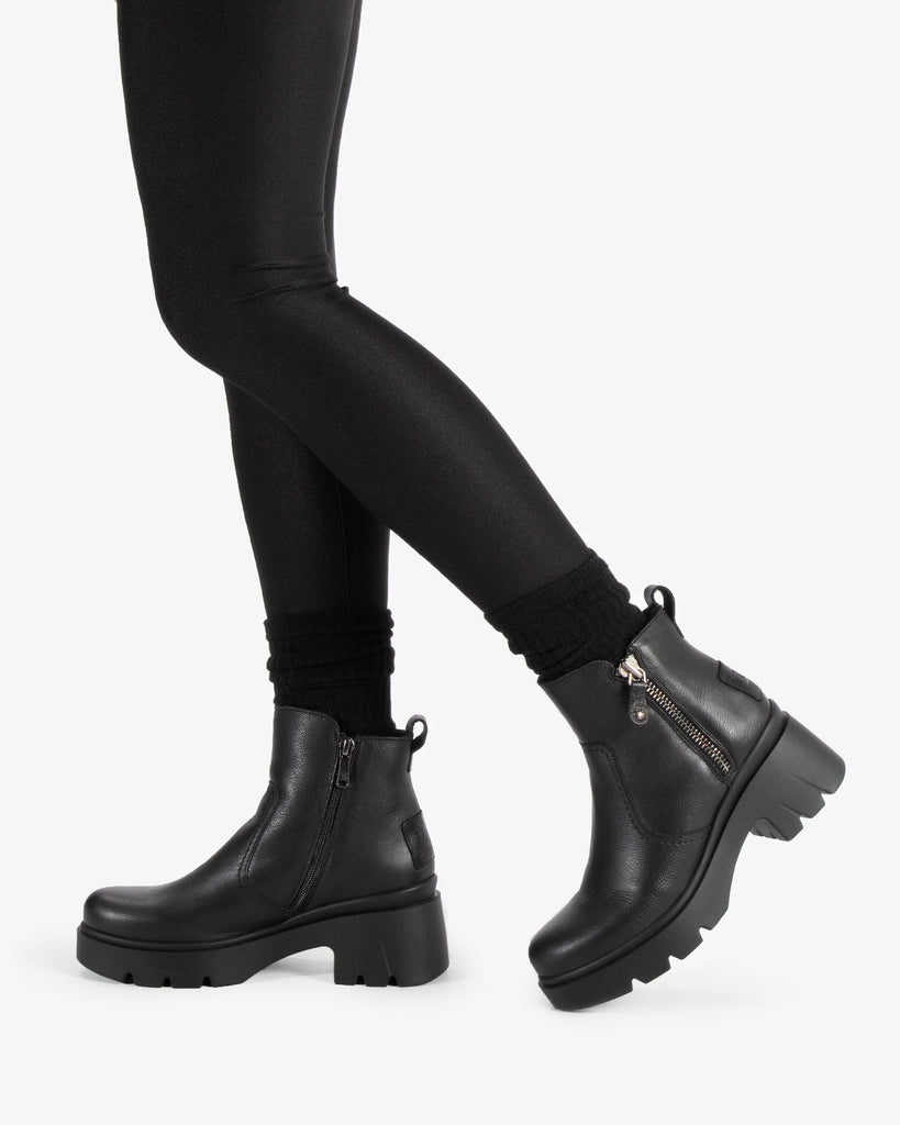 Phuket botas de piel con forro interior de pelo. negro